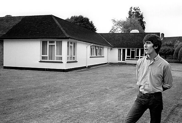 George Harrison at his Ester bungalow in Surrey. July 1964