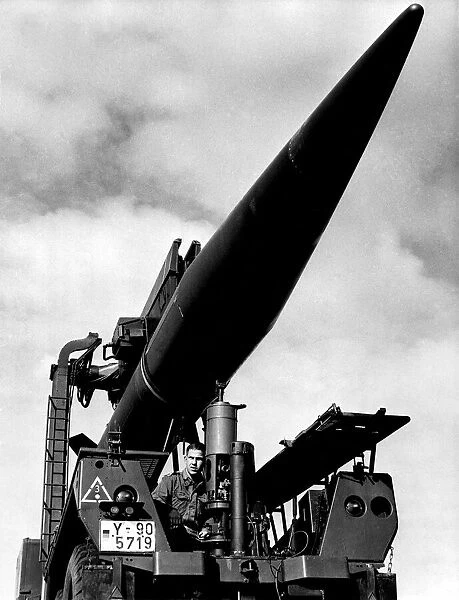A German gunner checks a Pershing missile before the launching on South Uist