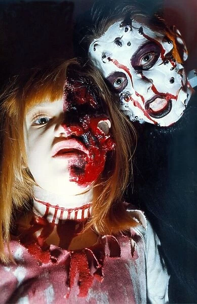 Ghouls Lauren Thompson and Tristan Laidlaw practice for Halloween decked in make-up in