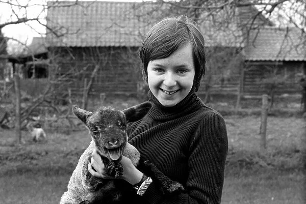 Girl with Lamb  /  Children  /  Animals: Miss Elizabeth Larter. February 1975 75-00916-002