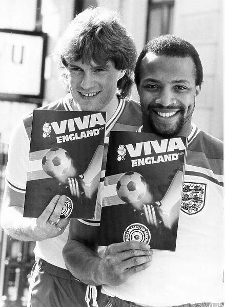 Glenn Hoddle (left) and Cyrille Regis (right) taking time off from preparing for