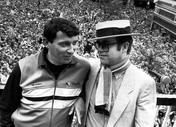 Graham Taylor Watford manager shares an historic moment with his chairman Elton John