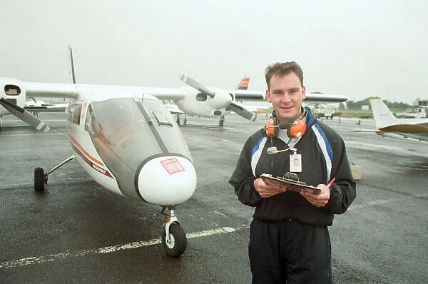 Graham Torrington of Skywatch, by the Partenavia aeroplane before take off