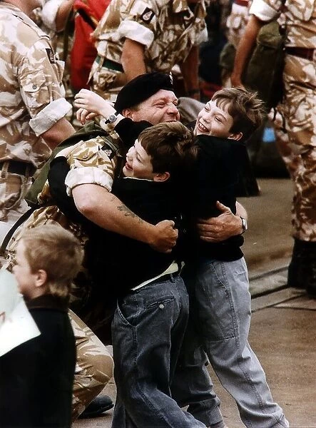Gulf War reunion A soldier is met by his two children returning from Gulf War