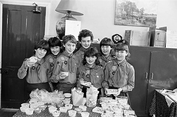 Highburton Guides are pictured with home made sweets at a coffee morning which raised