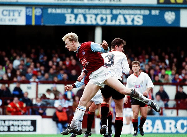 Iain Dowie Football player for West Ham United against Swindon jumping to head the ball