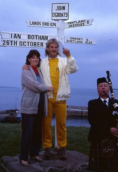 Ian Botham cricketer October 1985 With wife at John O Groats sign post piper