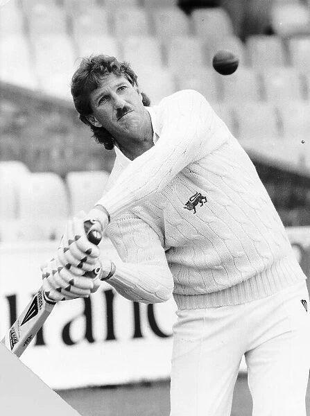 Ian Botham playing for Worcestershire in a Cricket Match against Essex