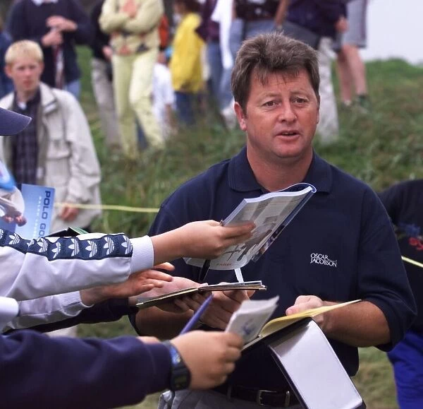 Ian Woosnam signs autographs during his practice round at the 128th Golf open at