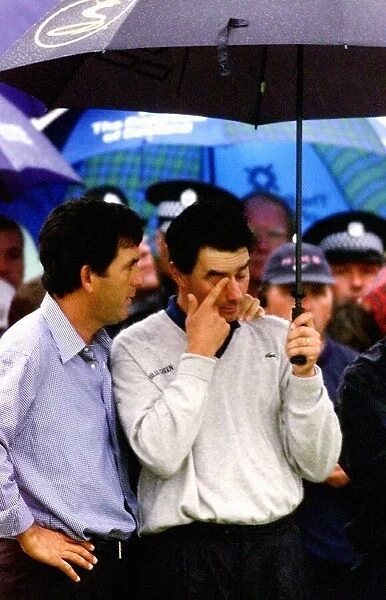 Jean Van De Velde is consoled as he waits at the winners presentation at Carnoustie