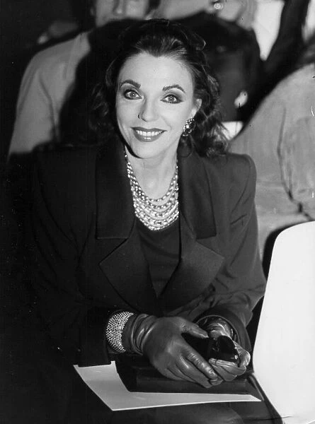 Joan Collins at fashion show 22  /  03  /  1989