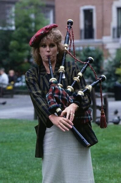 Joanna Lumley actress June 1989 trying to play bagpipes