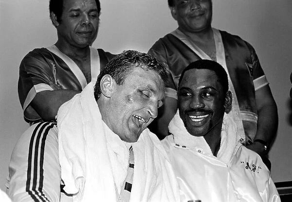 Joe Bugner with Marvis Frazier pose for the press following their bout at Atlantic City