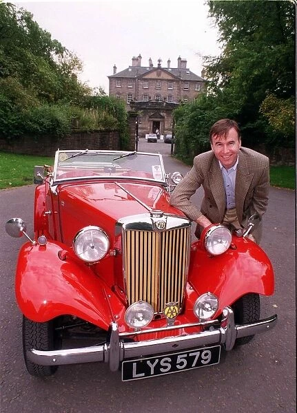 Joe ODonnell January 1999 With his MG car red sports car