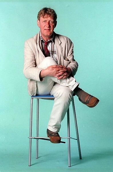 John Bett former Gregorys Girl actor June 1998 sitting on chair