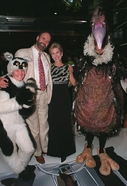 John Cleese with wife Alice faye and characters from his film Fierce Creatures at its