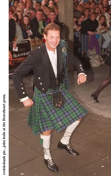 John Leslie at the premiere of the film Braveheart wearing tartan kilt Highland dress