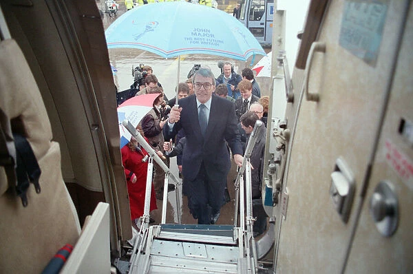 John Major during the general election campaign, pictured getting on an aeroplane