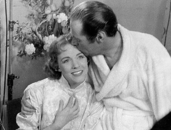 Julie Andrews kissed by Rex Harrison in her dressing room at the Drury Lane Theatre after