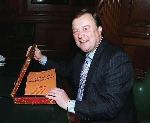 Kenneth Clarke MP and Chancellor of the Exchequer with the Budget Box at the Treasury