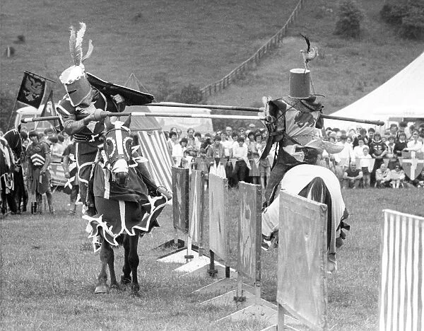 Two Knights clash at a jousting tournament in July 1984