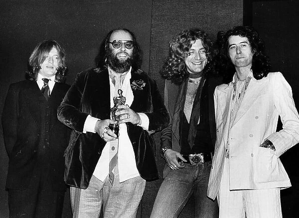 Led Zeppelin with their Ivor Novello Award John Paul Jones Peter Grant Robert Plant Jimmy