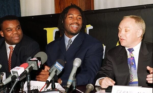 Lennox Lewis at press conference announcing next fight with Warren McCall at the Law