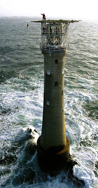 Lighthouse keeper Colin Jones seen here waiting on the helipad for the helicoptrt during