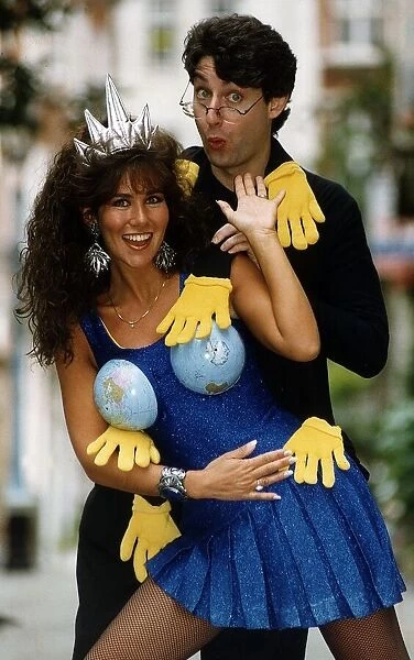 Linda Lusardi Model  /  TV Presenter with co-host Richard Brecker wearing the clothes of