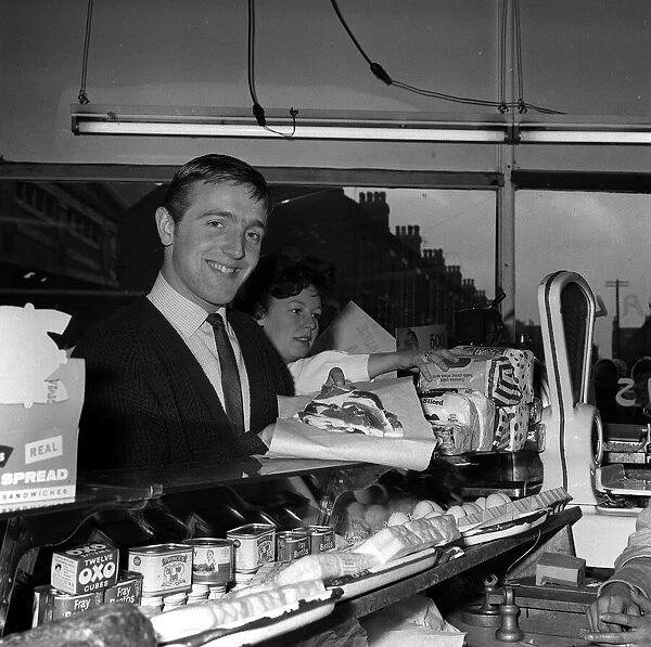 Liverpool left winger Peter Thompson buys the Bacon at the local shop for his