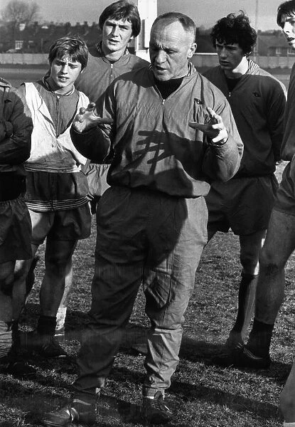 Liverpool manager Bill Shankly gives instructions to some of his players during a