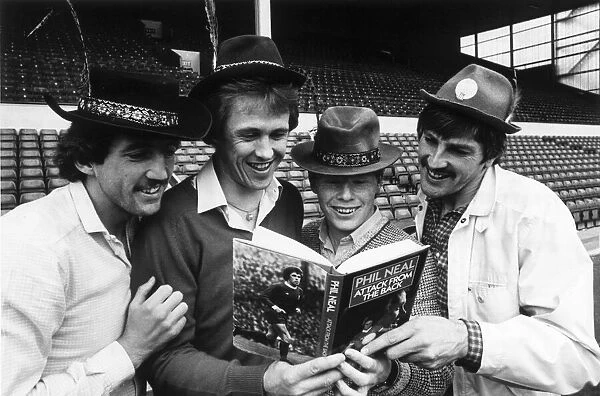 Liverpool players Alan Kennedy, Phil Neal, Sammy Lee and Steve Heighway looking at