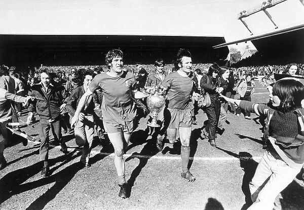 Liverpool players Tommy Smith and Emlyn Hughes parade the league championship trophy
