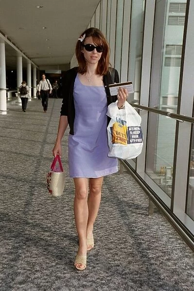 Liz Hurley Actress June 98 Leaving heathrow airport for Nice
