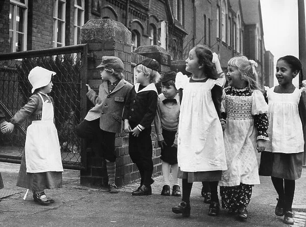 It looked like a scene from Dickens as these youngsters made their way to school in