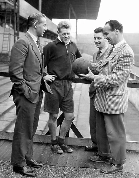 Manager Frank Taylor (right) talking to Frank Bowyer, Tony Allen and Doug Newlands