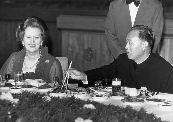 MARGARET THATCHER AND CHINESE PREMIER ZHAO ZIYANG AT A BANQUET IN THE GREAT HALL OF THE