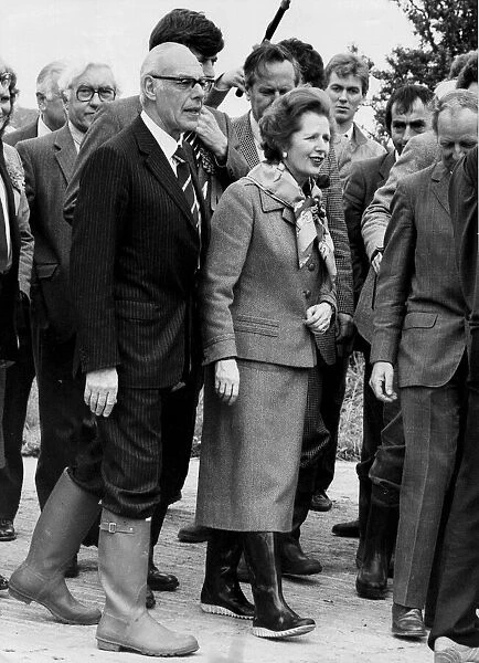 Margaret Thatcher and husband Denis wearing wellington boots during visit to Padstow