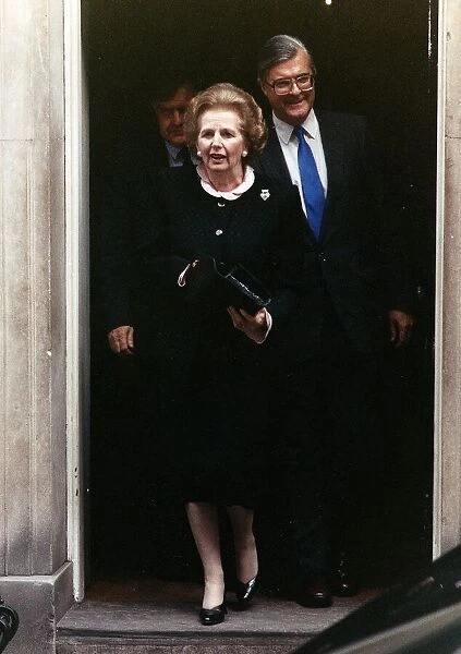 Margaret Thatcher leaving No. 10 Downing Street followed by Kenneth Baker October