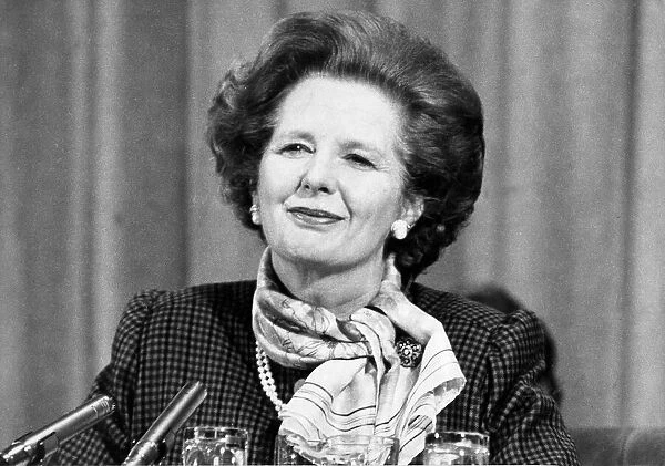 Margaret Thatcher smiling during press conference - January 1985