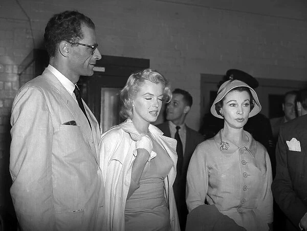 Marilyn Monroe actress with husband Arthur Miller at London Airport July 1956