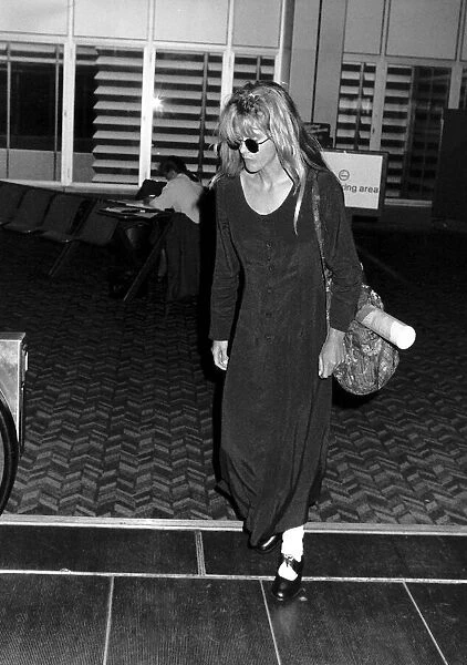 Meg Ryan Actress leaving Heathrow Airport for Los Angeles