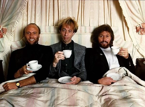 Members of the Bee Gees Pop Group Barry Gibb right with brothers Robin Gibb centre