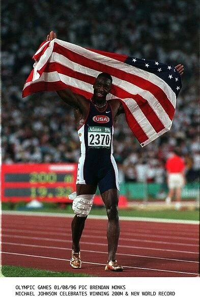 Michael Johnson American athlete celebrates winning the 200m final