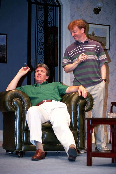 MICHAEL MELIA & JOHN SALTHOUSE IN A SCENE FROM THE PLAY ABSENT FRIENDS BY ALAN AYCKBOURN