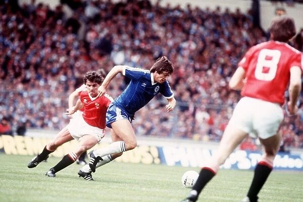 Michael Robinson of Brighton & Hove Albion running with the ball during the 1983 FA Cup
