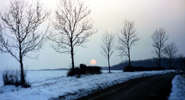 The mid-winter sun slowly sets on a Hertfordshire landscape