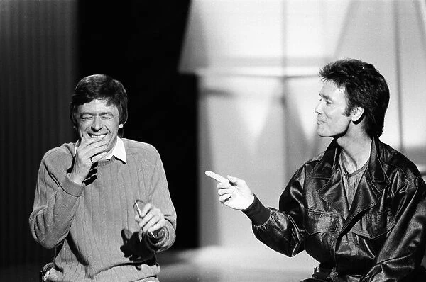 Mike Yarwood filming his Thames TV Christmas show with Cliff Richard. 11th December 1984