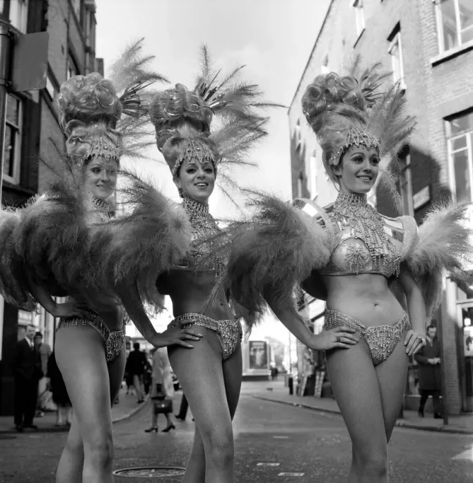 Framed Print : Black and white print of eight women in show costumes Framed Print : Black and white print of eight women in show costumes