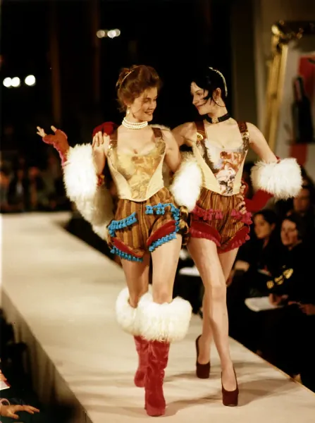 Model on the cat walk moddeling Vivienne Westwood designs at a fashion show waspies